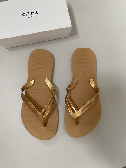 Gold havaianas flip flops UK 4